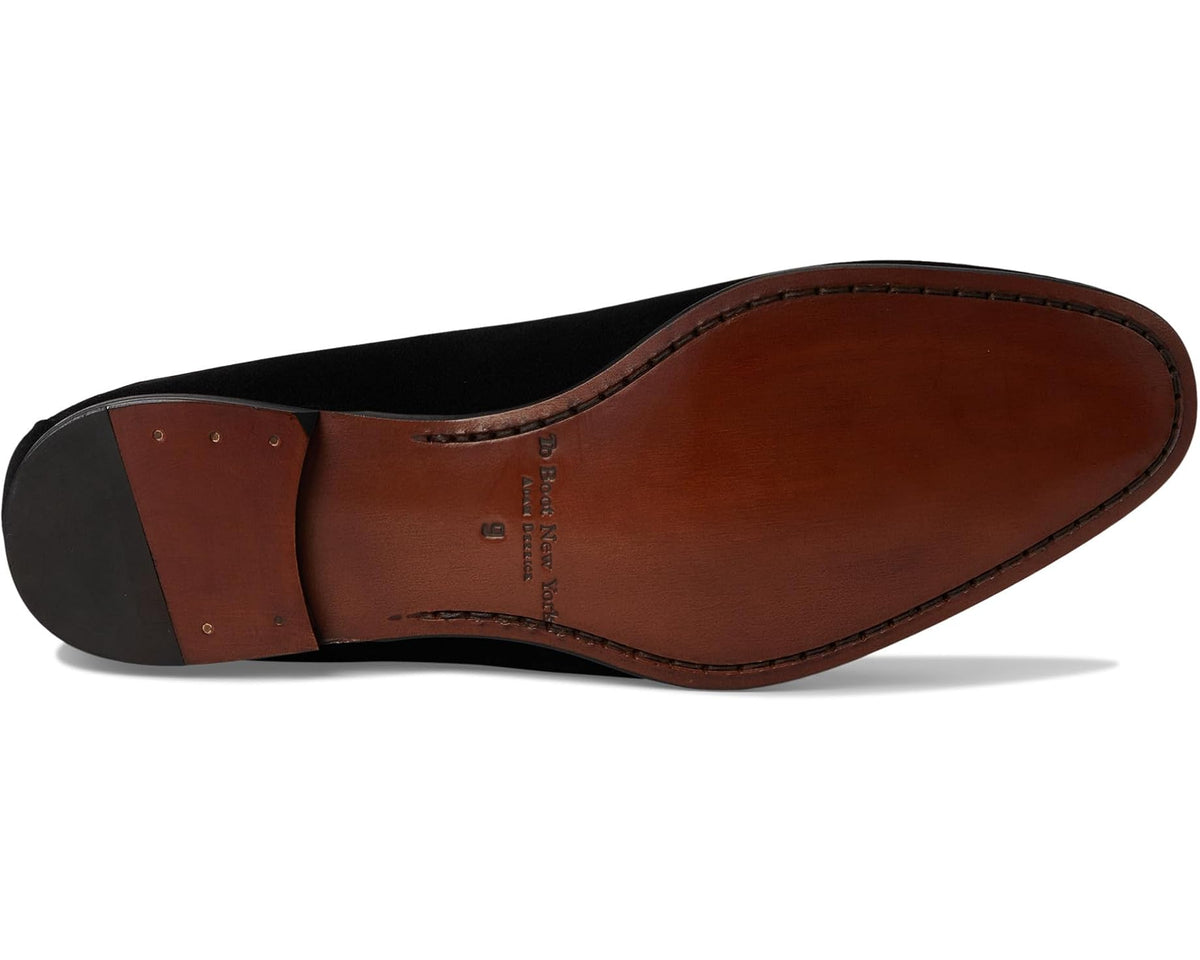 Men's black suede loafer with leather outsole and embossed lettering