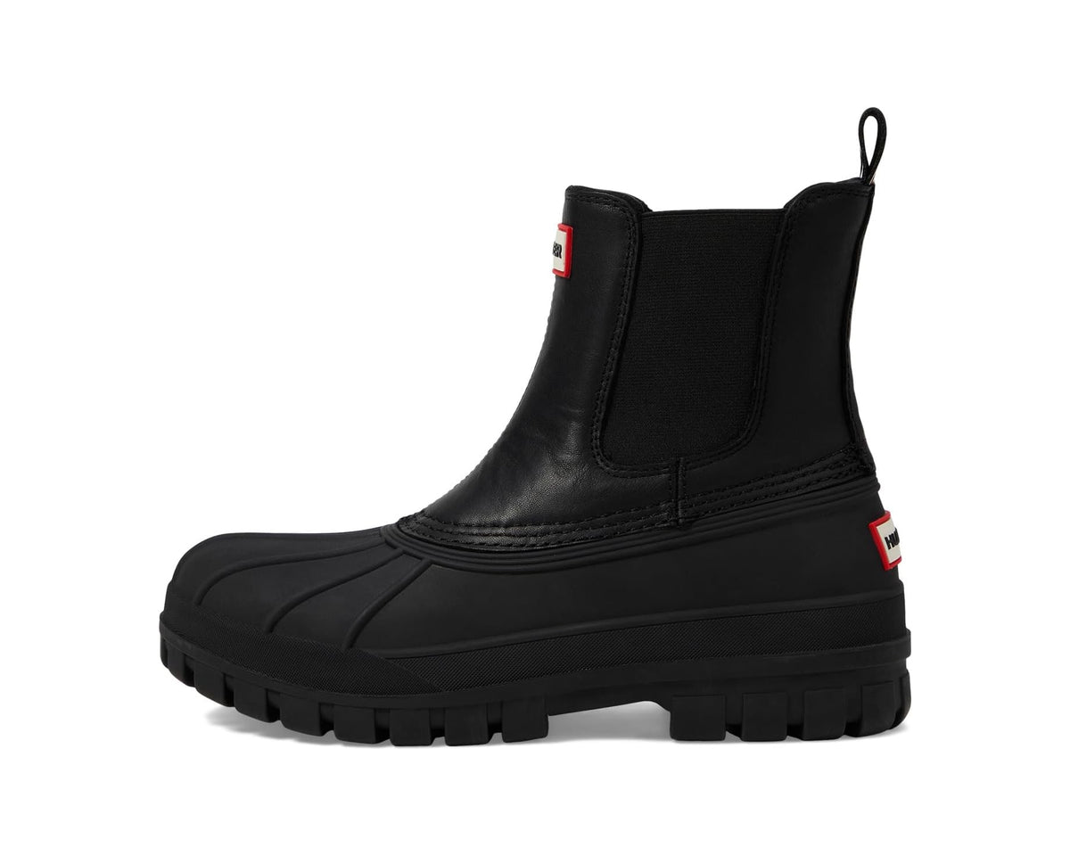 Black leather Hunter Chelsea boots with side pull tab and thick rugged sole