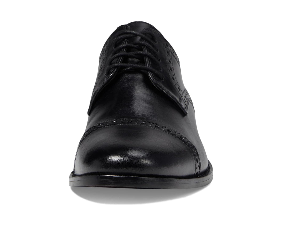 Black cap-toe lace-up Oxford dress shoes, front view with glossy finish