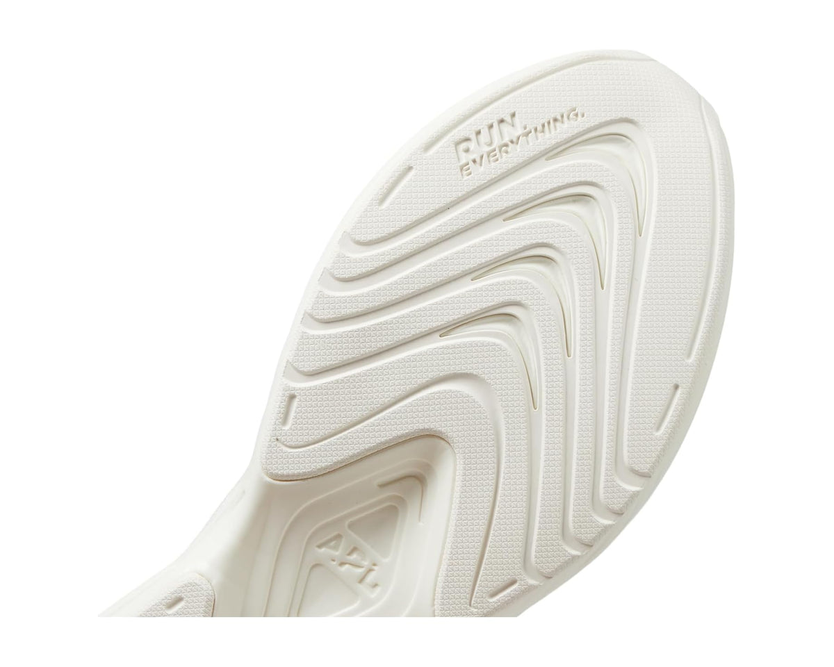 Ivory APL sneaker outsole with textured traction pattern and brand marks