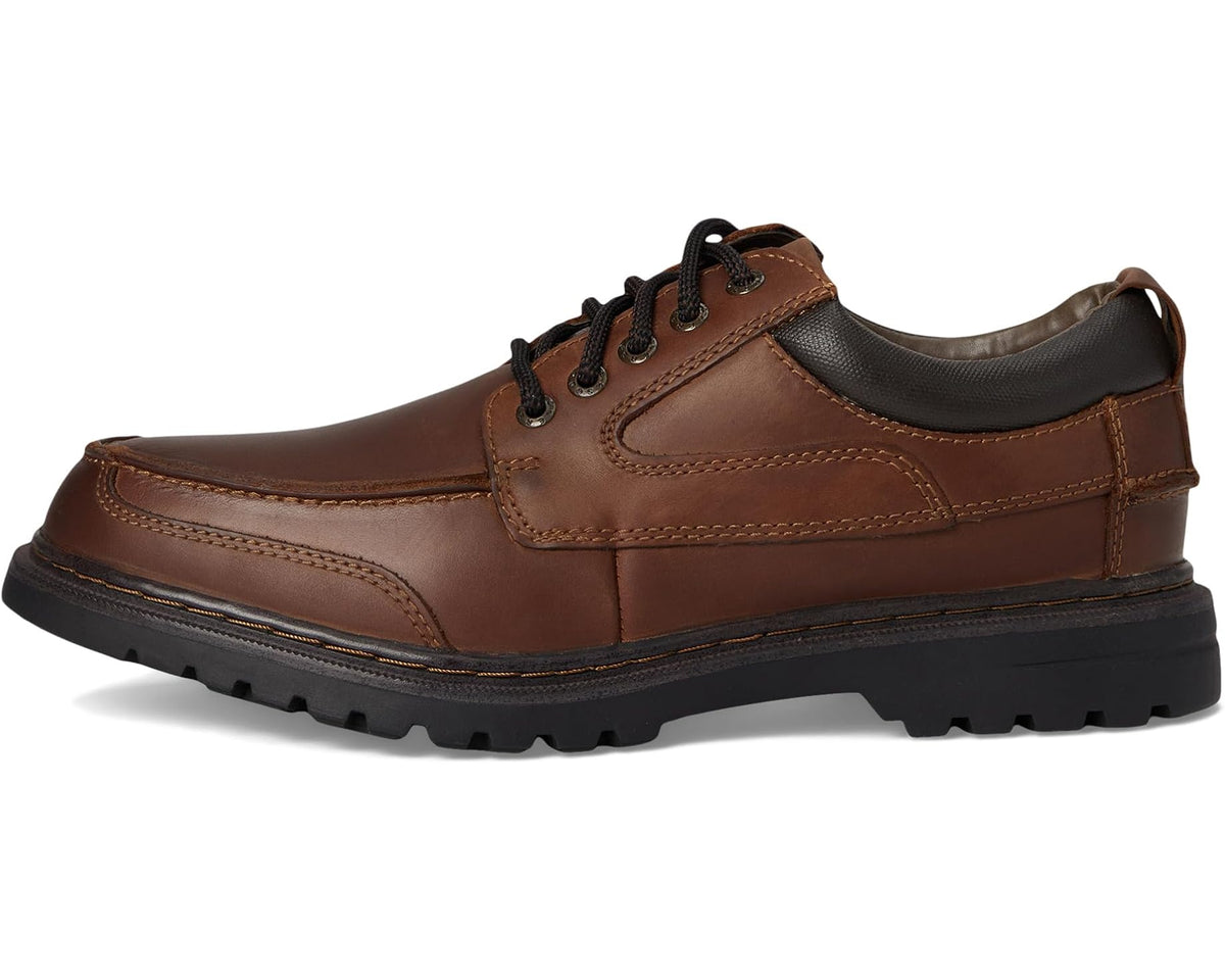 Men's brown leather lace-up work shoe with thick rubber sole and stitched details