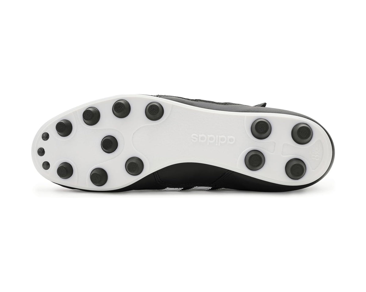 Underside of black adidas firm-ground soccer cleat with studded outsole