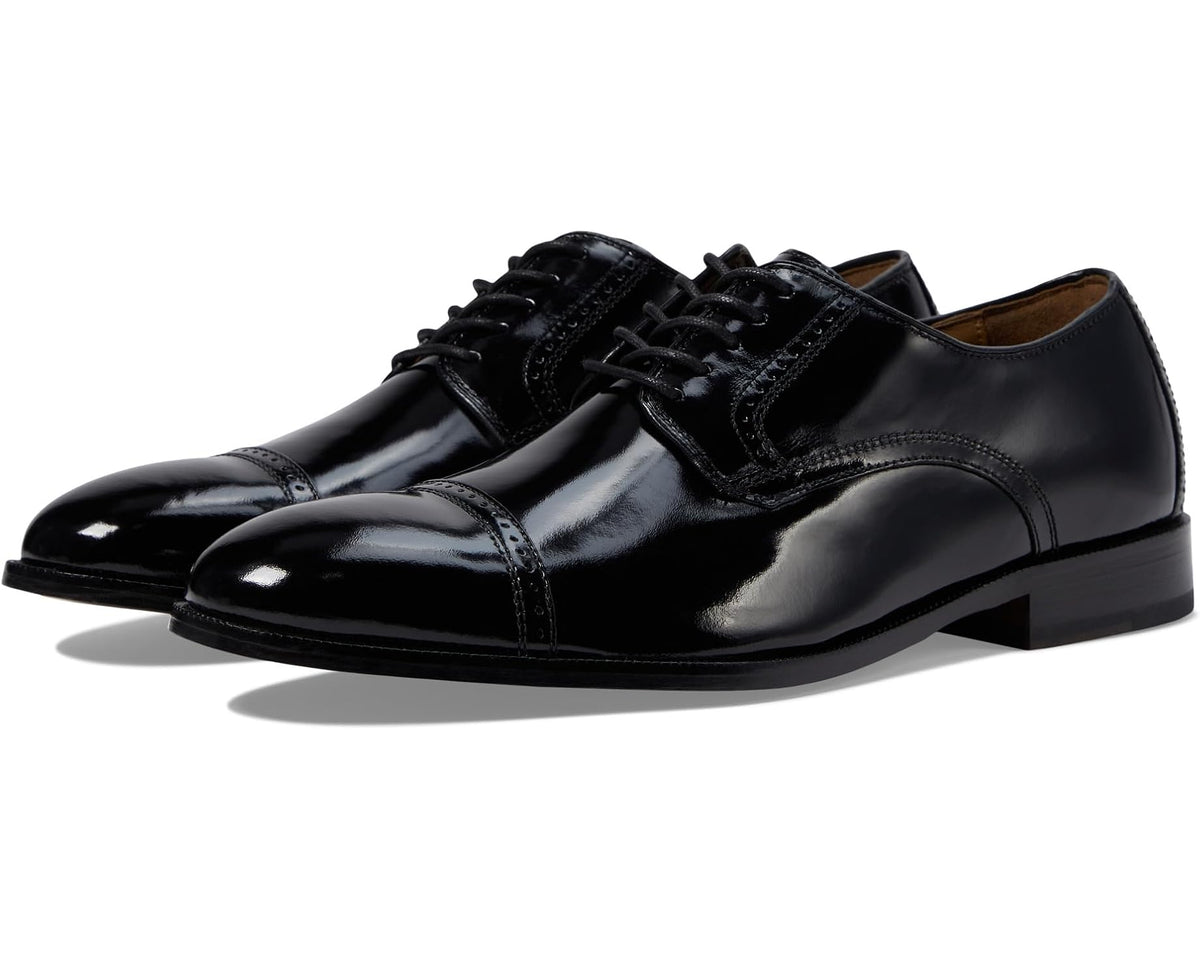 Men's black cap-toe Oxford dress shoe with lace-up front and glossy brush-off finish