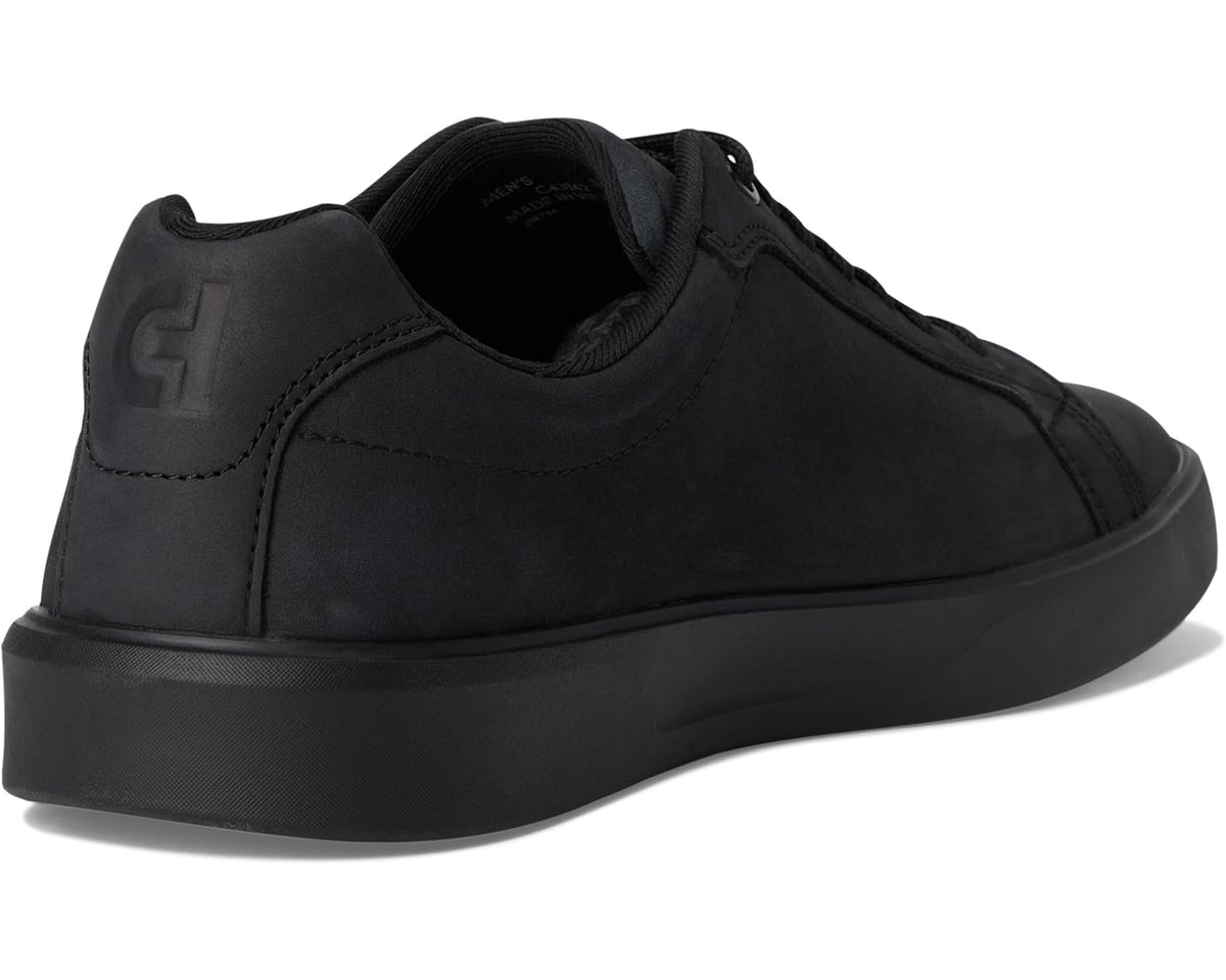 Black sneakers heel view with cushioned collar and side logo