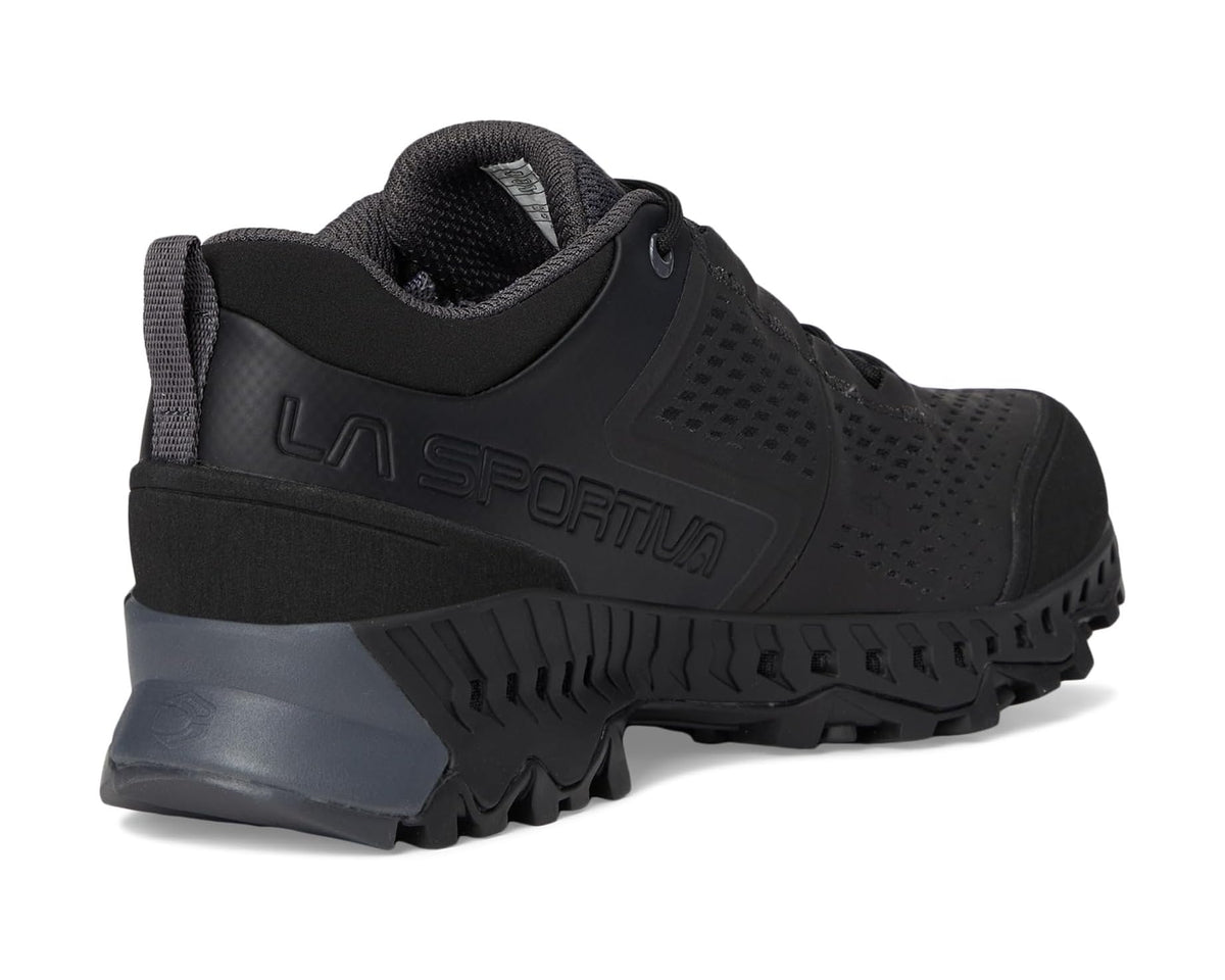 Men's black trail shoe heel view with grippy tread and padded back collar