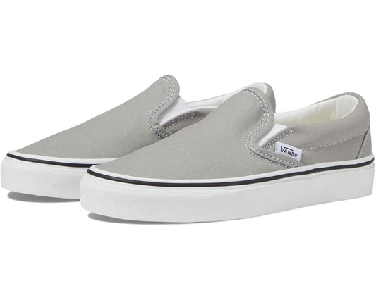 Vans unisex Classic Slip-On sneakers in gray canvas with white rubber sole