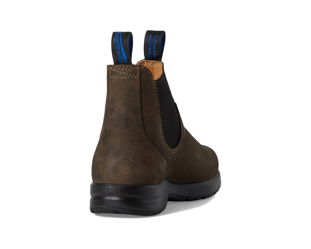 Rustic brown suede Chelsea boot rear view with black elastic panel and blue tabs