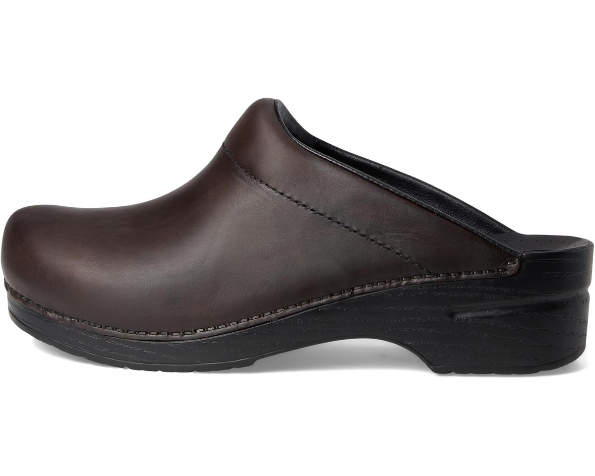 Brown leather slip-on clog with low-profile black heel and apron stitching