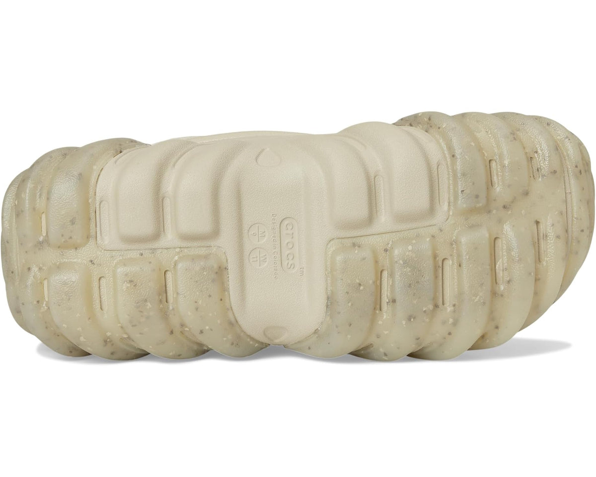 Echo boots outsole in light beige with deep tread blocks and molded grip pattern