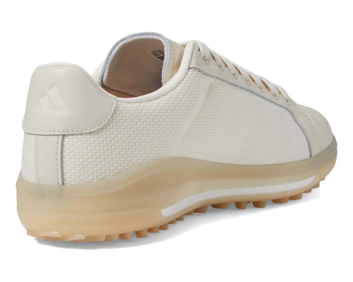 Men's adidas golf shoes heel view in chalk white with cushioned collar and beige outsole.