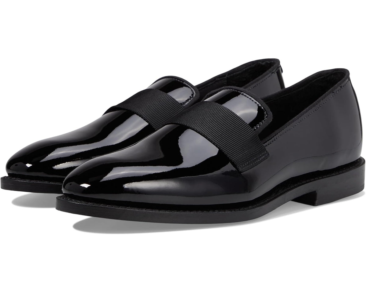 Black patent leather loafer with wide strap and low-profile outsole