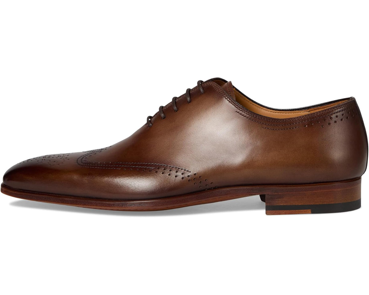 Men's taupe-brown leather oxford shoe with lace-up, wingtip detailing, and low heel