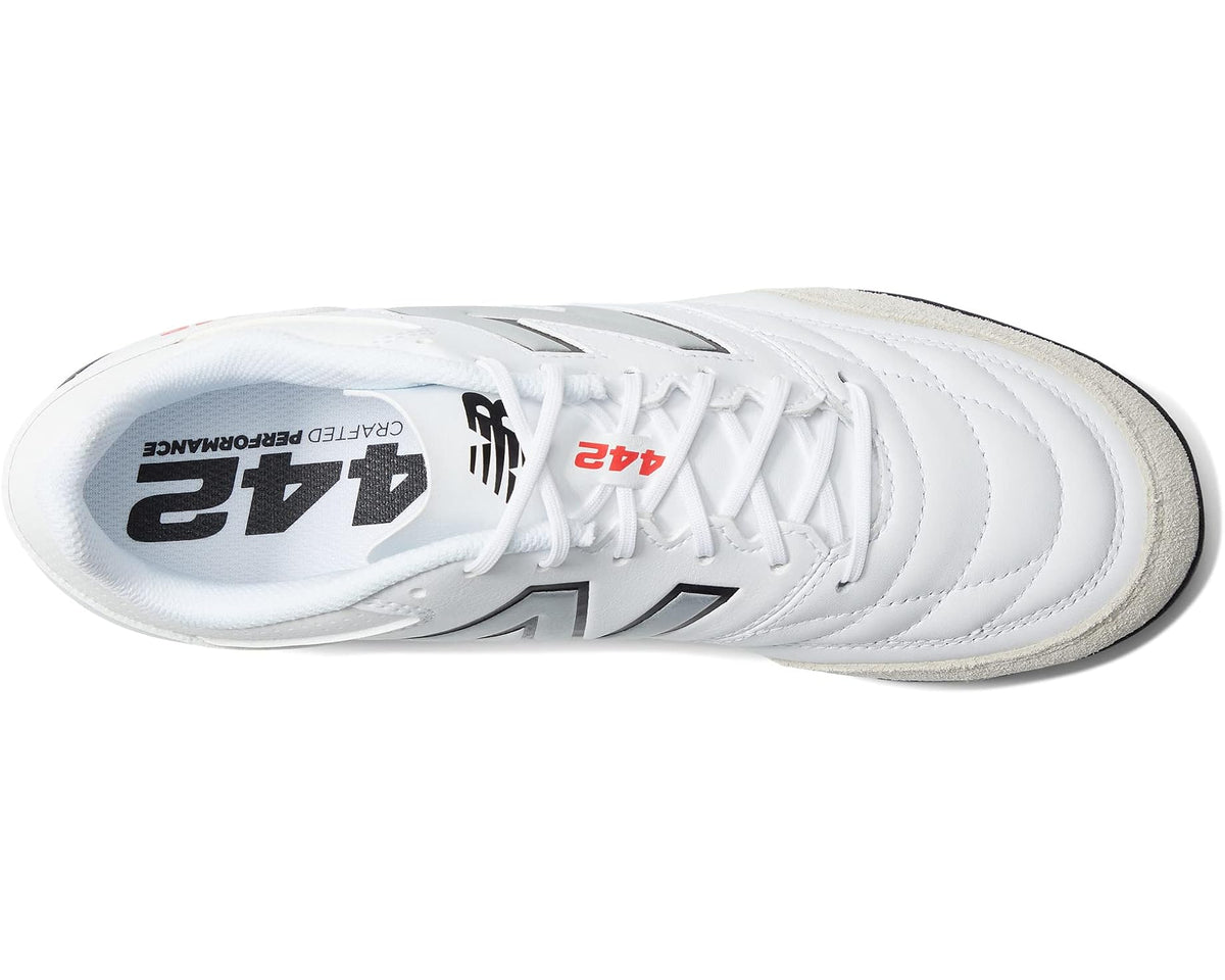 Men's white turf soccer cleats, top view with 442V2 logo and red accents