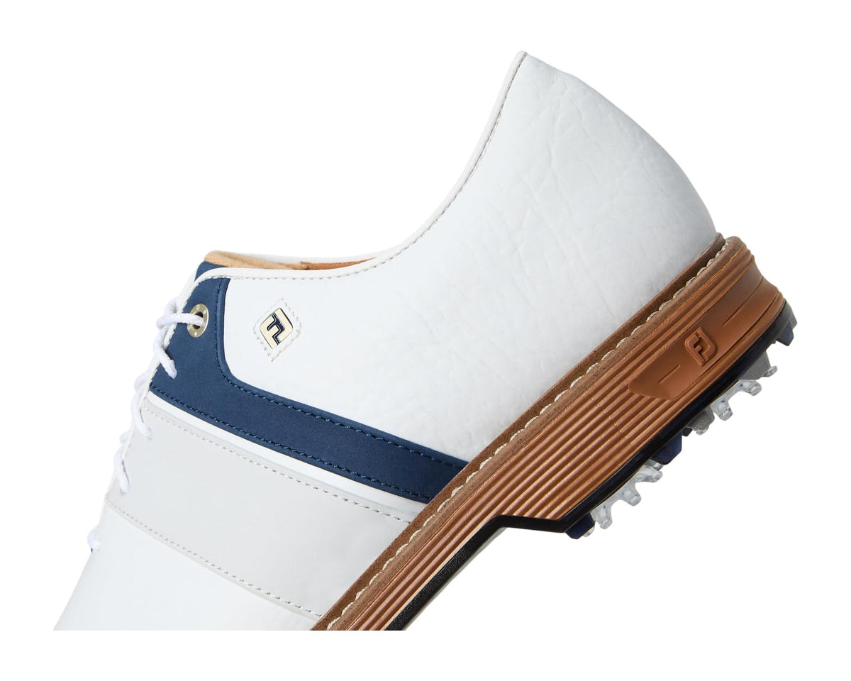Men's FootJoy golf shoe side view with navy stripe and ribbed brown outsole.
