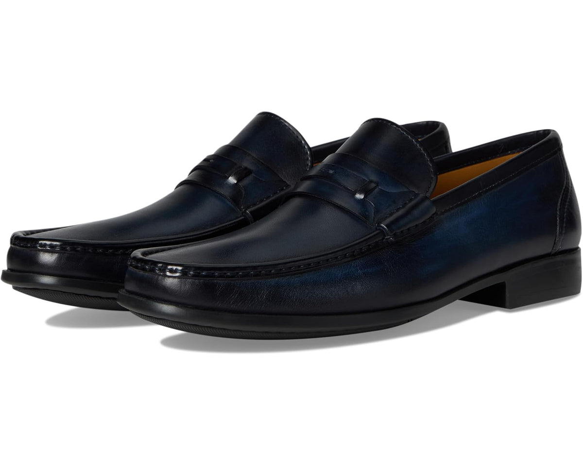 Men's navy leather slip-on loafer with stitched apron and low block heel
