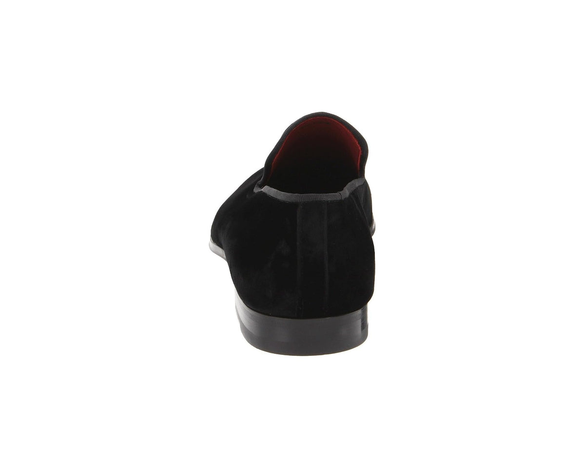 Black suede loafer back view with low dark rubber sole