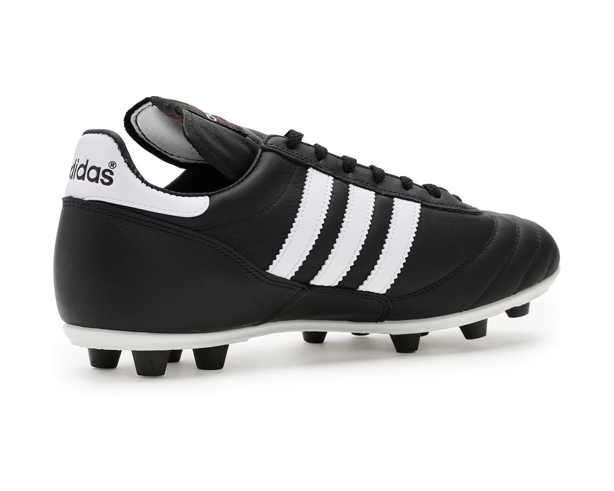 Black adidas soccer cleat with white Adidas stripes and firm-ground stud sole