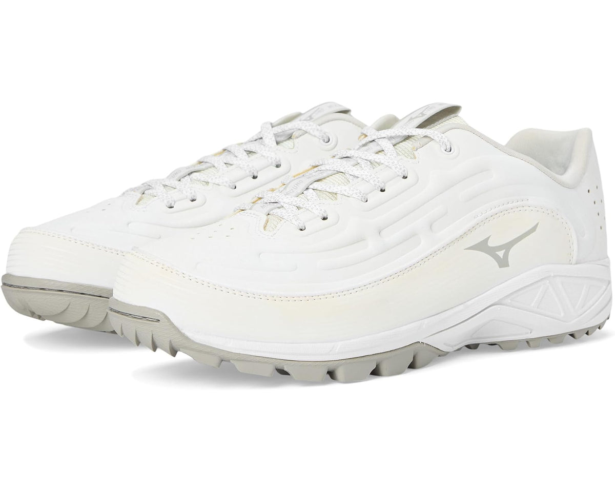 Mizuno men’s white low-top lace-up athletic shoe with textured side panel and tread sole