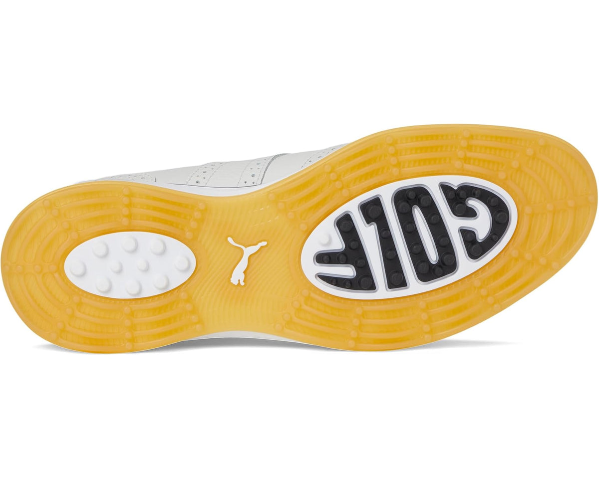 Gum rubber outsole with traction pods and PUMA mark, underside of white golf shoe