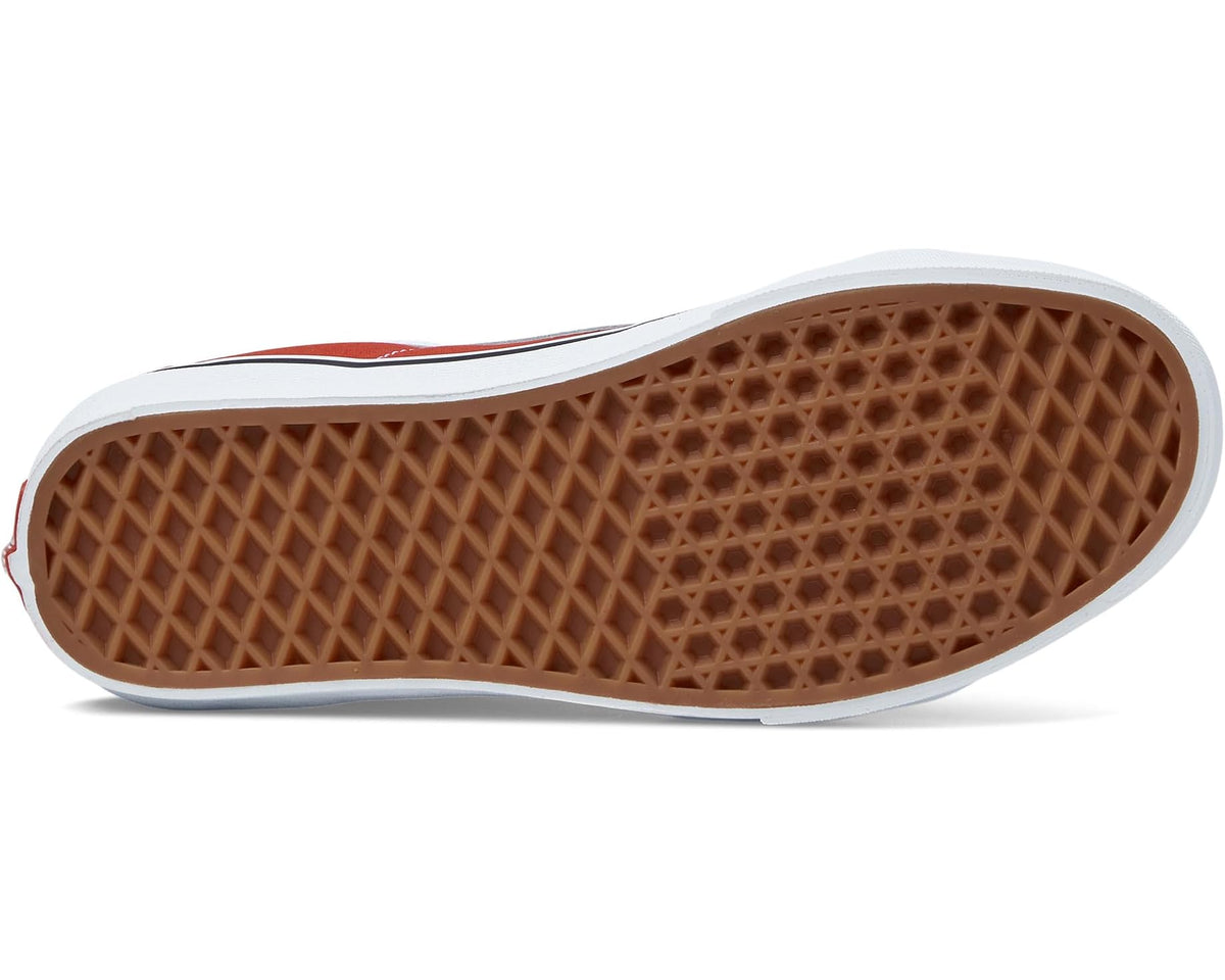 Red high-top sneaker outsole with textured waffle tread and white rubber edge