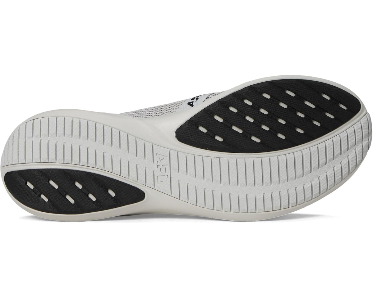 Light gray sole with black traction pods on APL Euphoria sneakers
