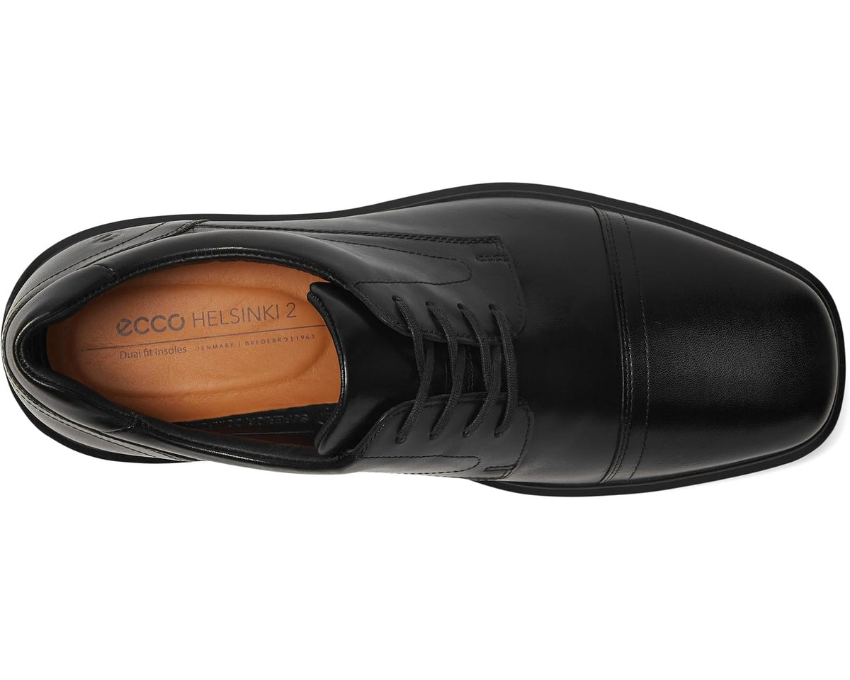 Black lace-up oxford shoe showing interior lining and stitched upper seam