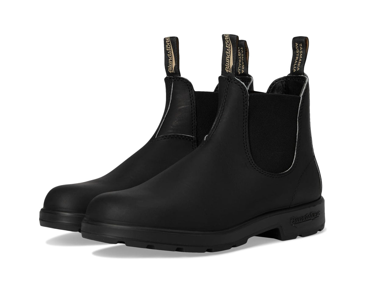 Black Chelsea boots with elastic side gores and pull tabs, rugged sole