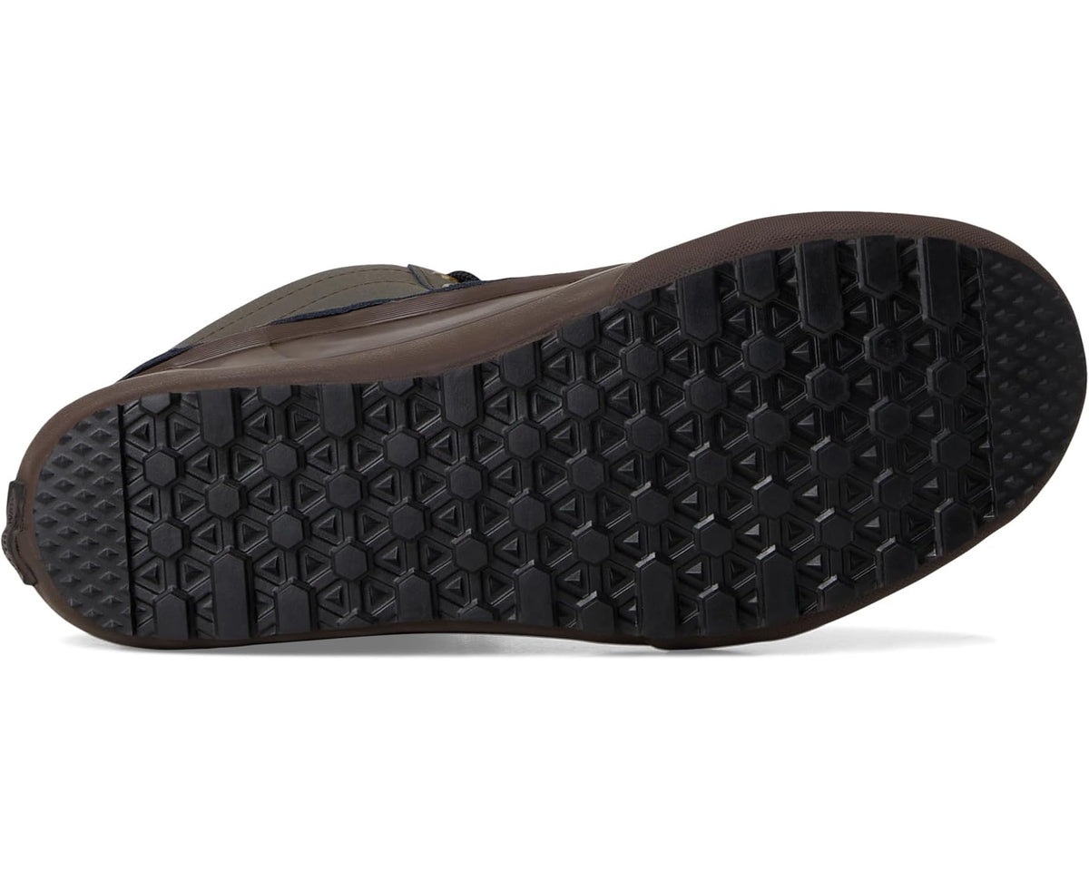 Waterproof boot outsole view with deep tread pattern and dark rubber edge