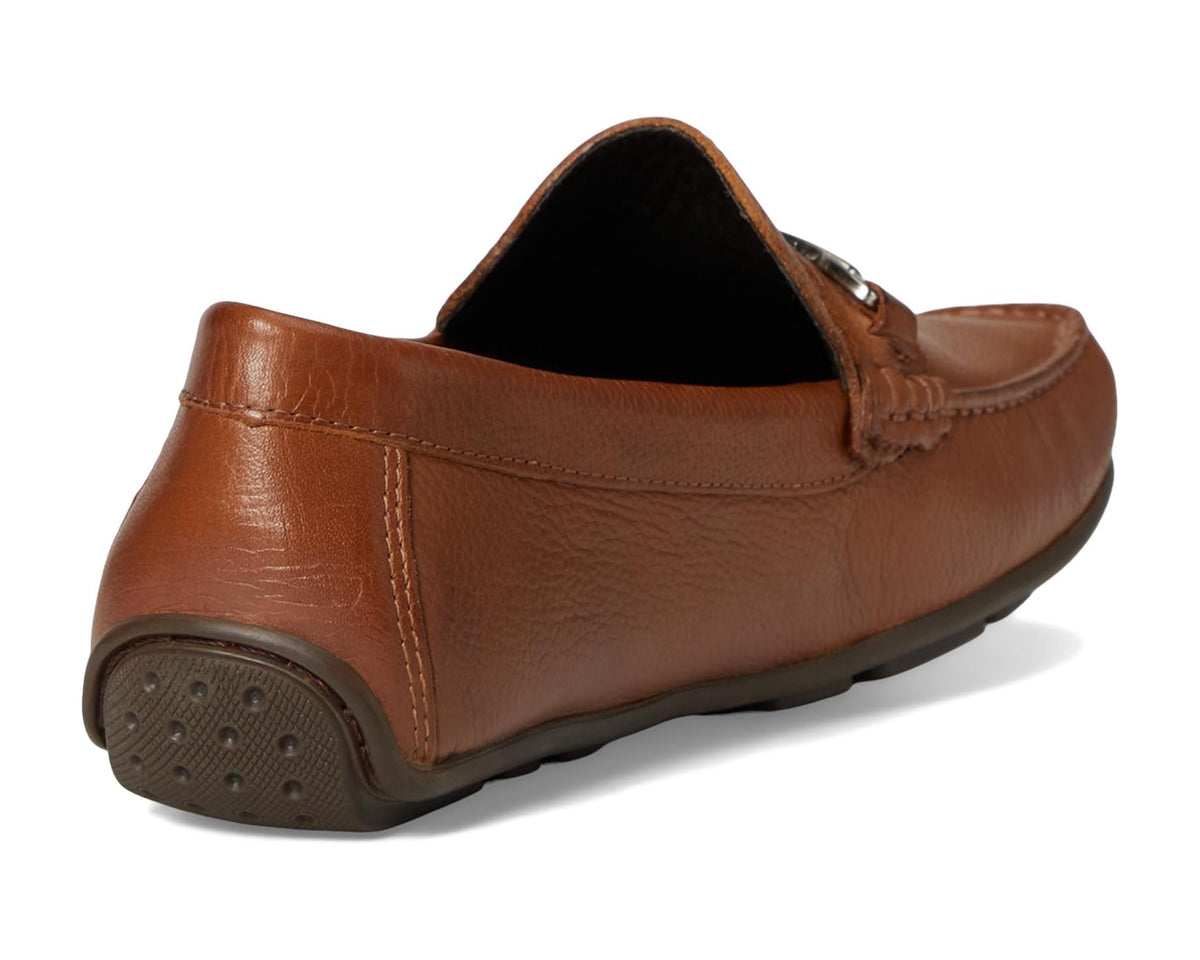 Men's cognac leather loafer heel view with dark lining and rubber outsole tread