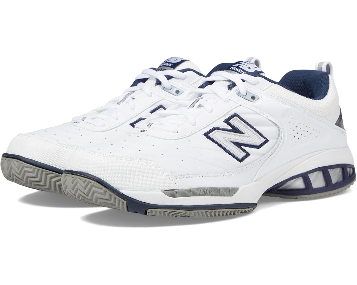 Men's New Balance 806 tennis shoes in white with navy accents and lace-up design