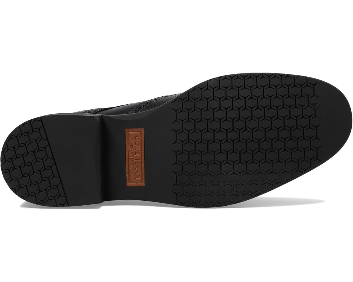 Black oxford shoe outsole with textured hex tread