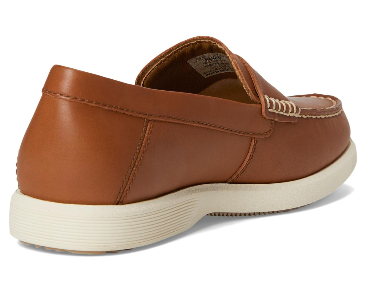 Tan leather slip-on loafer with padded collar, back seam detail, and light sole
