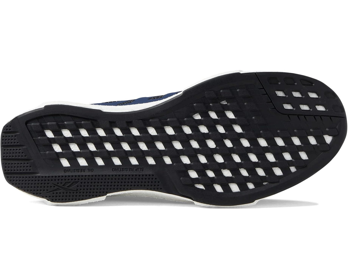 Men's Reebok navy work shoe outsole view with patterned tread and white midsole