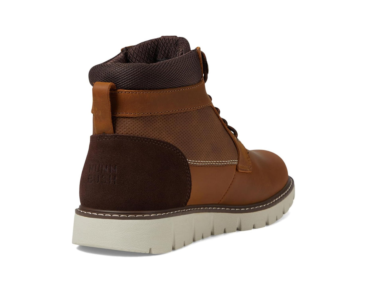 Tan and dark-brown chukka boots, heel view with lace eyelets and cushioned collar