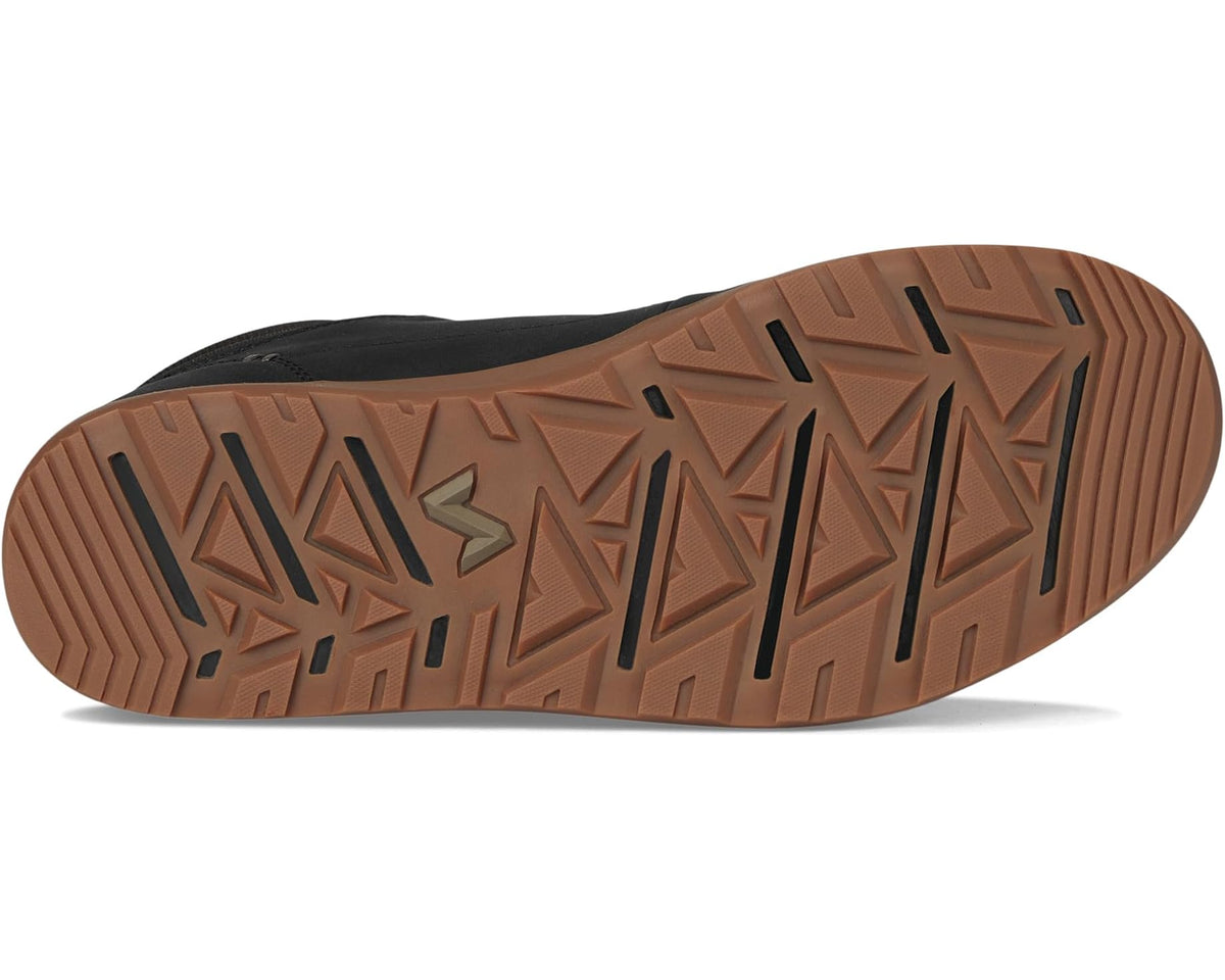 Black boot outsole with chunky traction tread and brown rubber edge