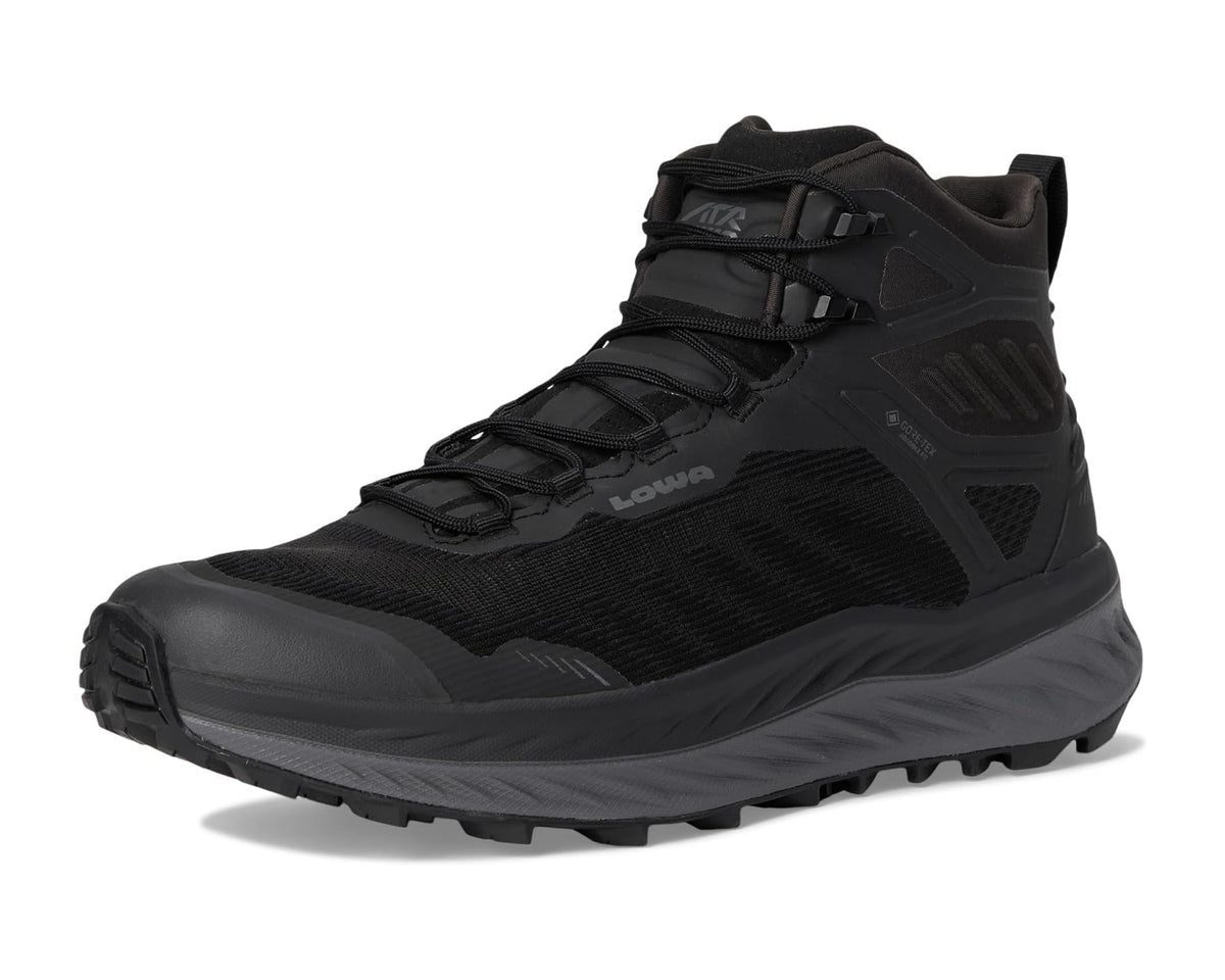 Black lace-up hiking boot with strap details and rugged traction sole