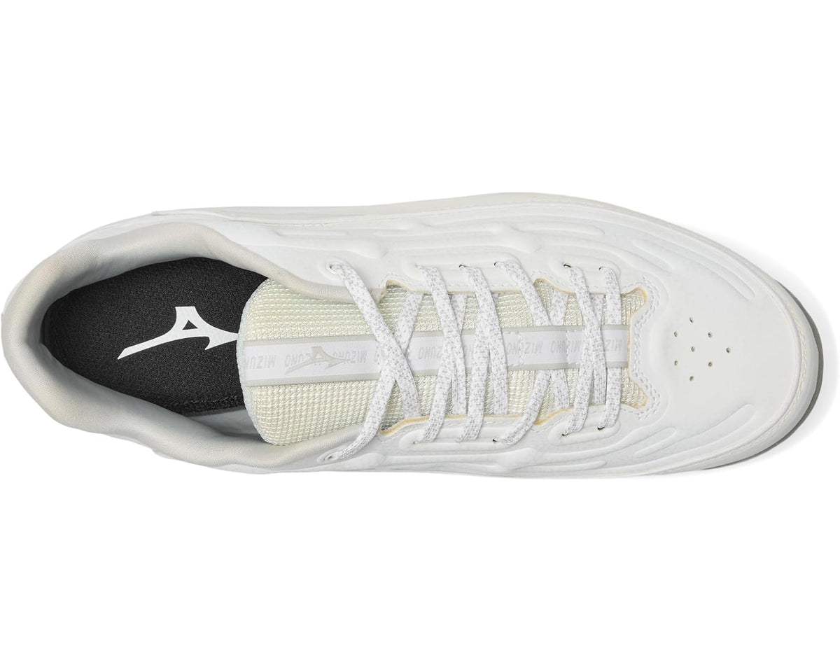 Mizuno white low-top shoe with gray lace loops and black-lined tongue interior