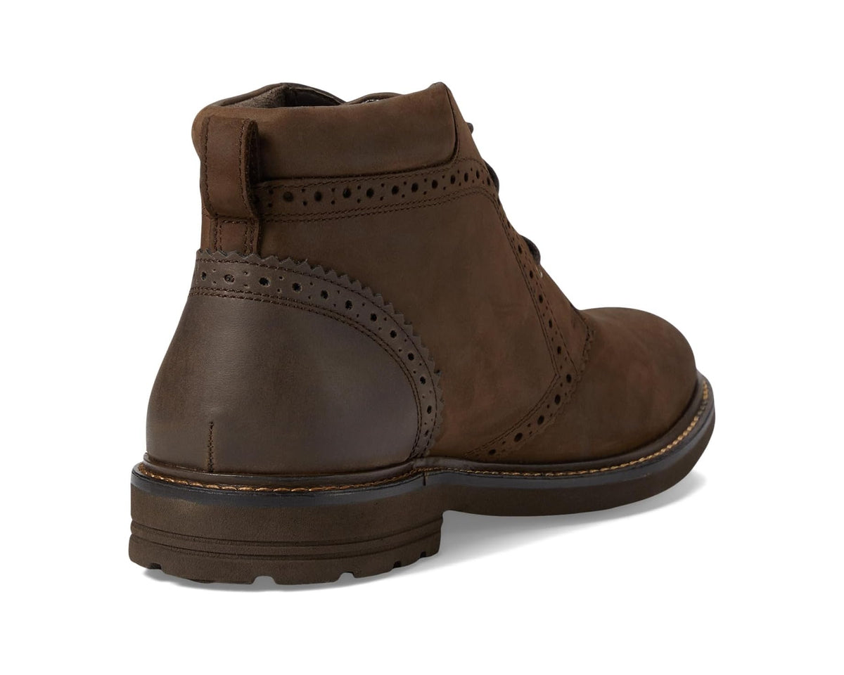 Men's brown leather chukka boots with heel detail and side brogue perforations