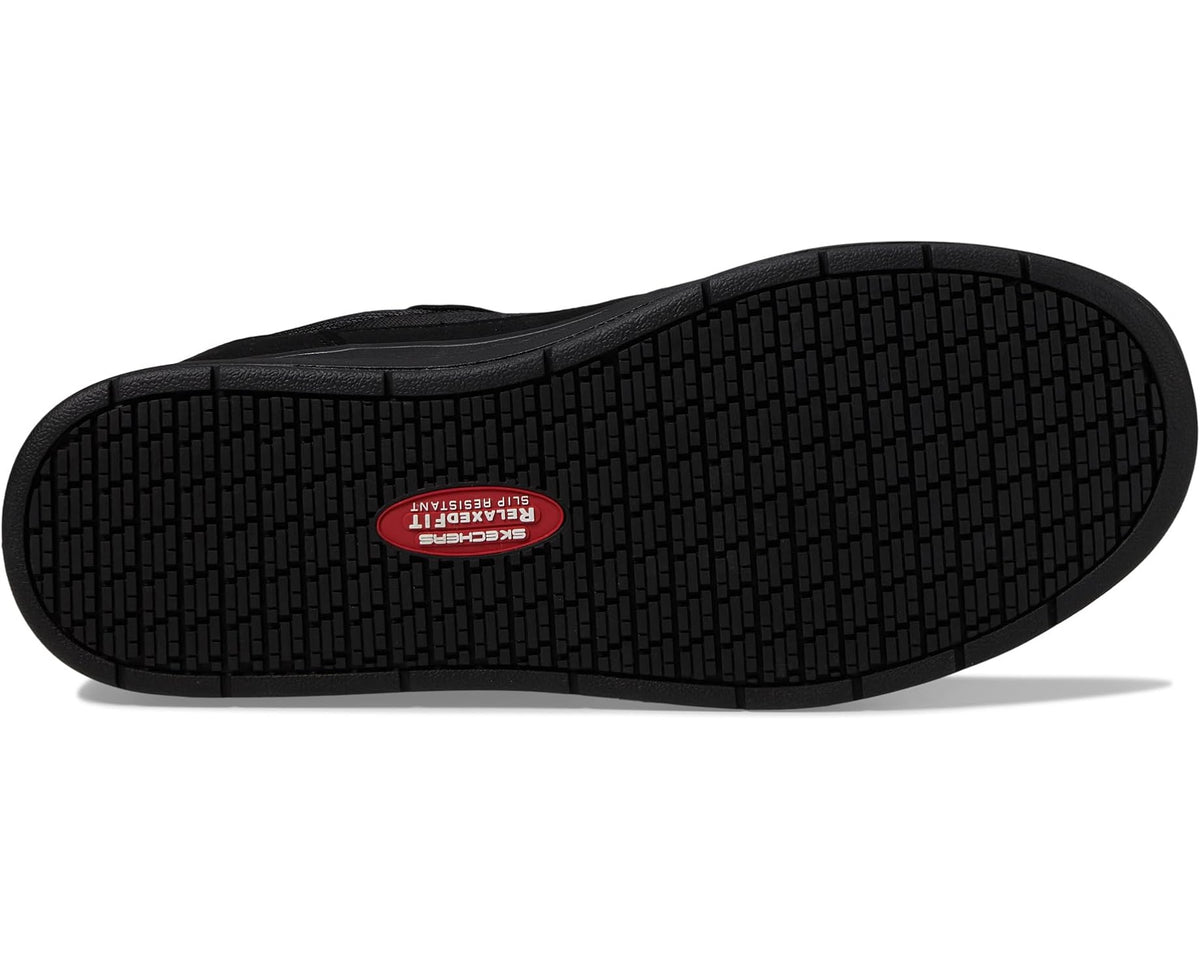 Black rubber outsole with grid tread and red logo label