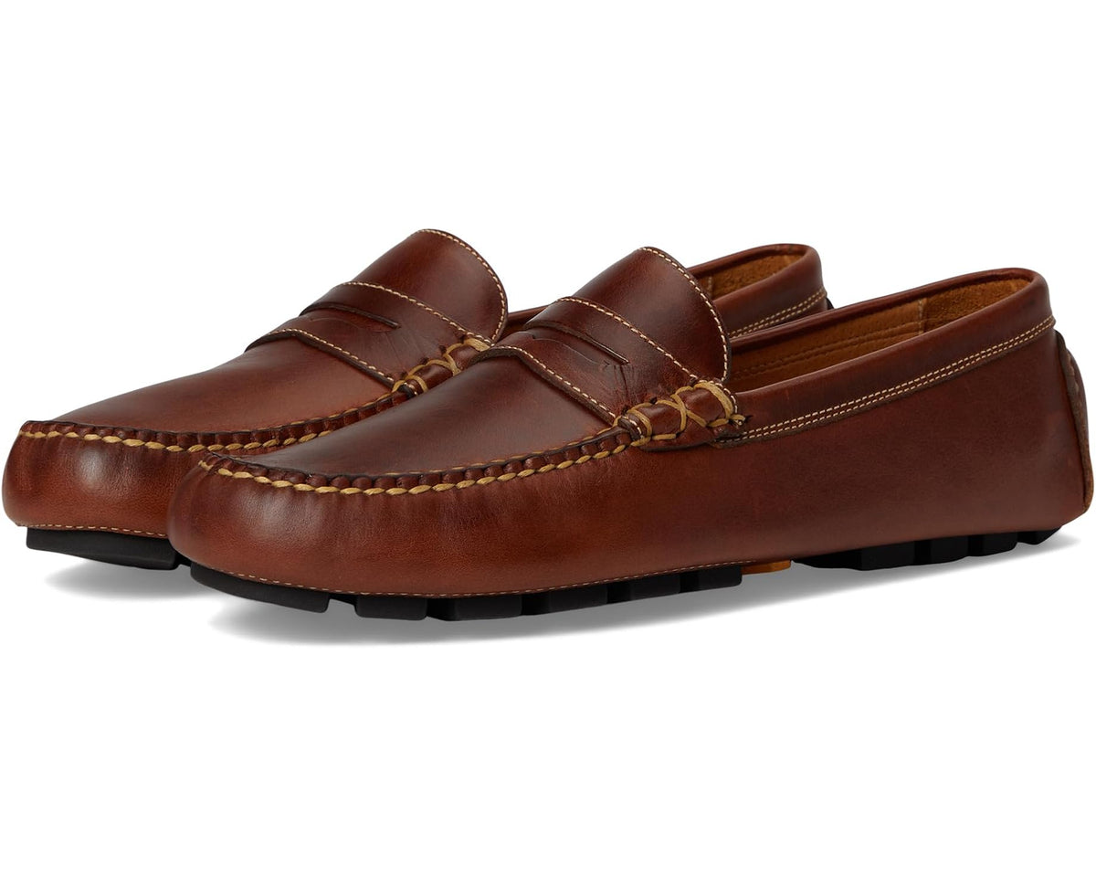 Cigar brown leather penny loafer with moc stitching and strap detail