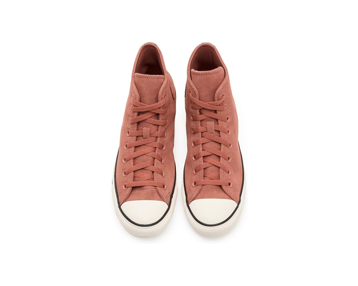 Pair of burnt orange suede high-top sneakers with lace-up and white toe caps