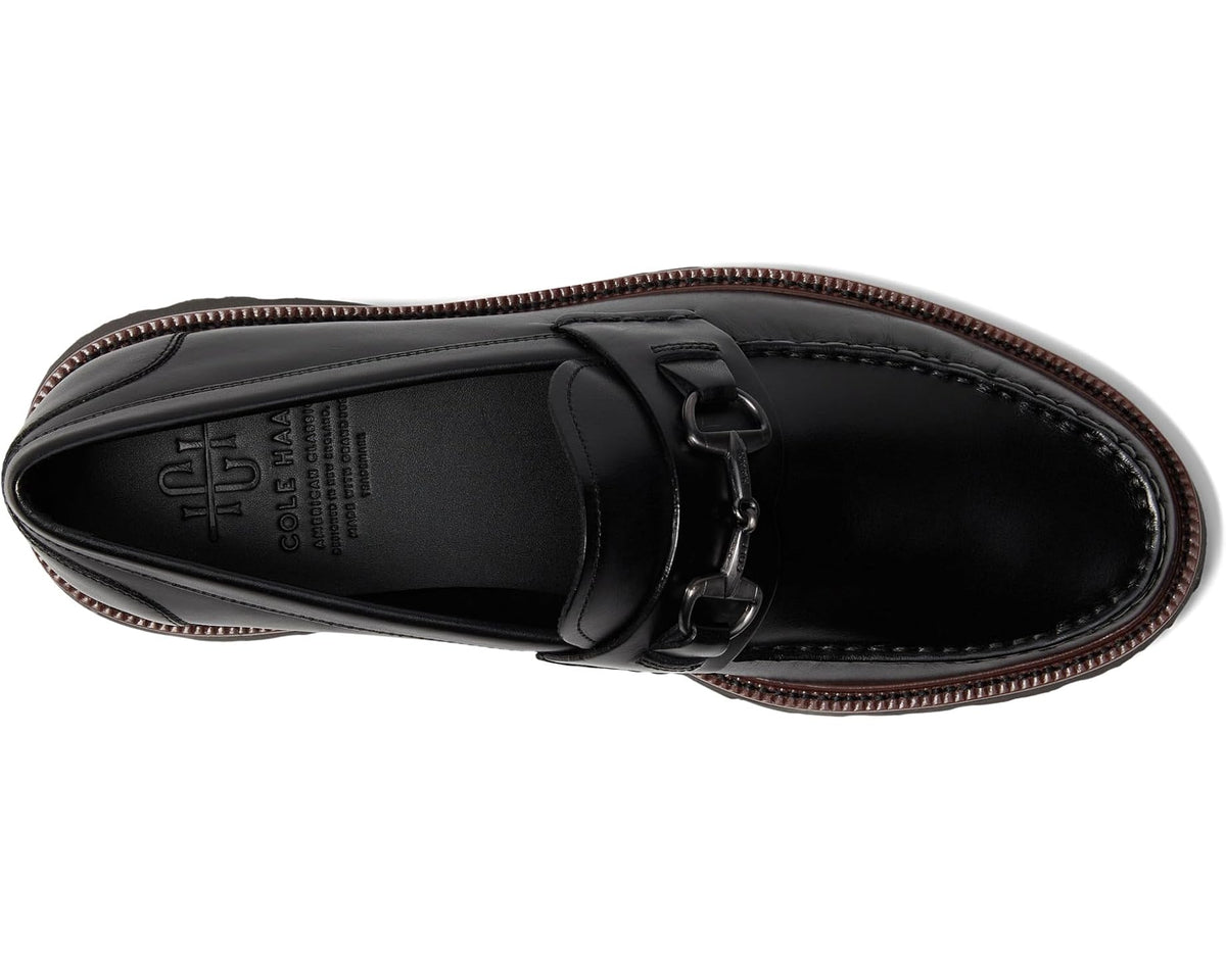 Black leather loafer outsole-side view with bit hardware and padded insole