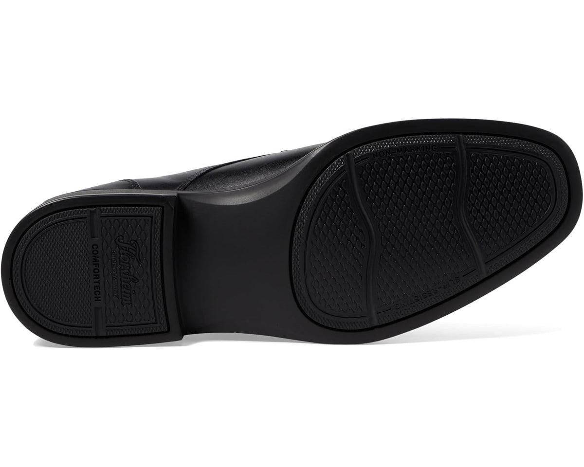 Men's waterproof oxford shoe sole view, textured tread and stitched upper, black