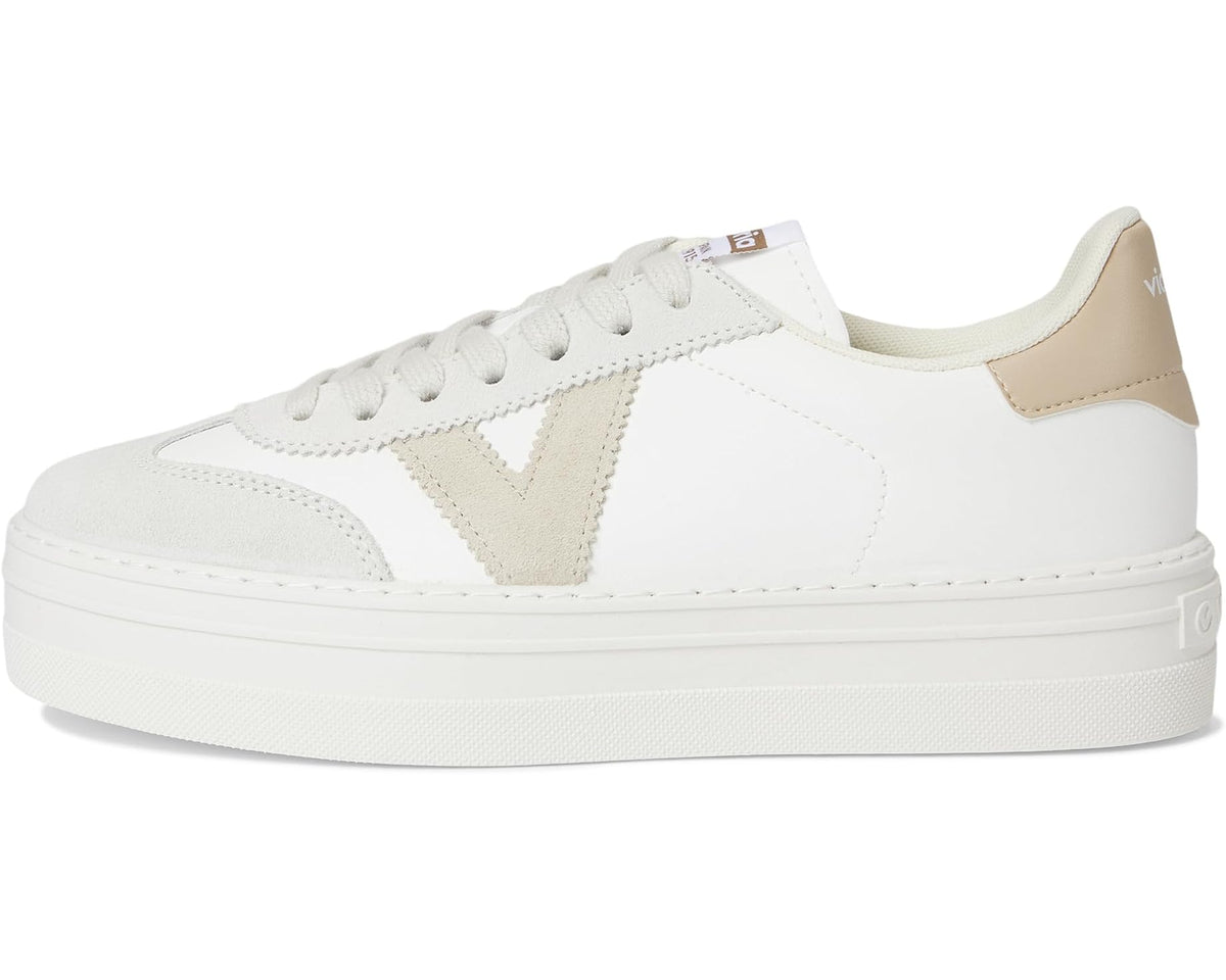 Unisex low-top sneakers side view, white leather with beige heel and panel accents