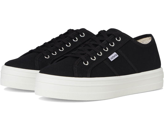 Black canvas low-top sneakers with lace-up eyelets and white rubber sole