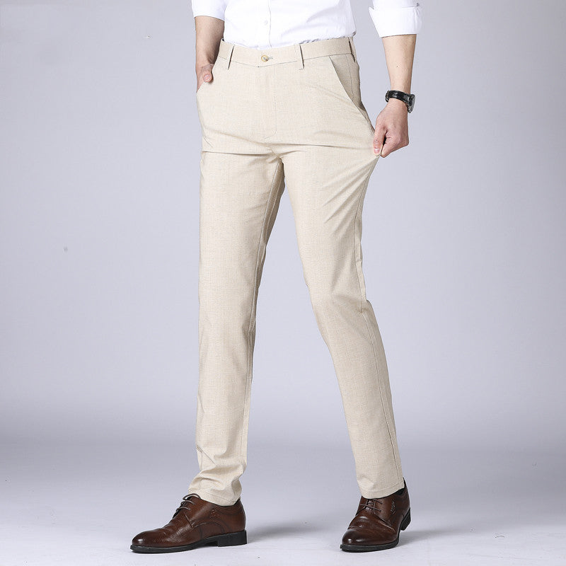 Men's thin dress pants in beige, belt loops, button closure, straight leg