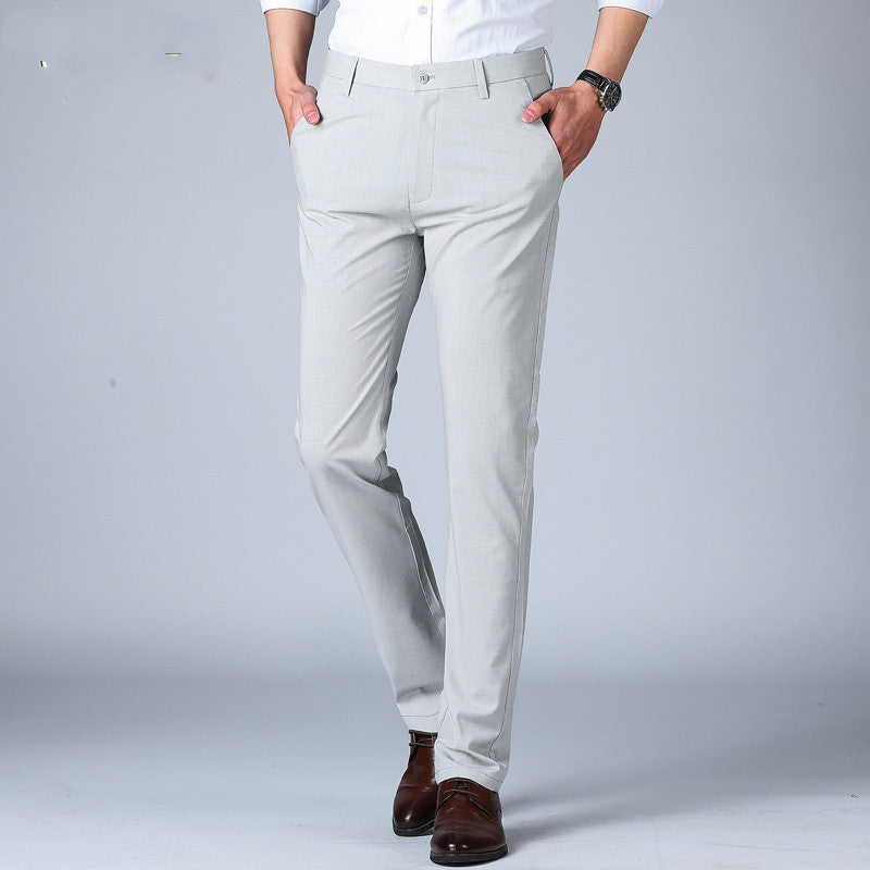 Men's thin dress pants in light gray, belt loops, button closure, straight leg