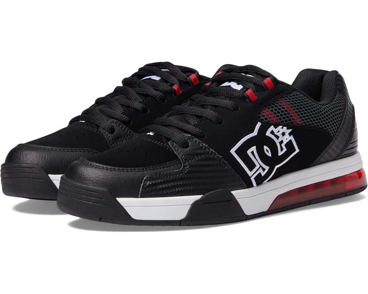 Black DC low-top skate sneakers with white midsole and red accents, lace-up.
