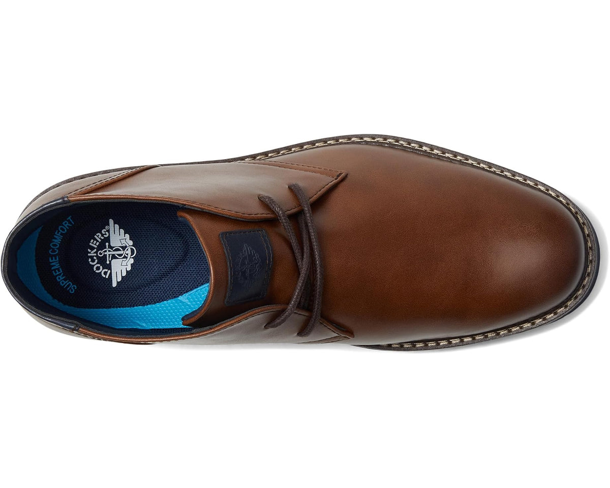 Cognac leather chukka boot toe with lace-up and navy interior lining