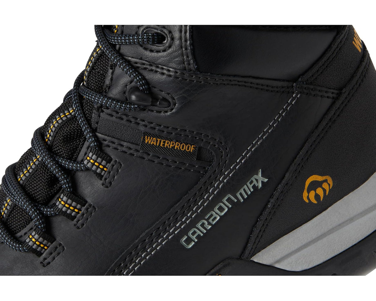 Black waterproof work boot upper detail with stitched panels and Carbon max branding